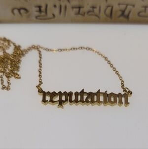 Goldtone Reputation Eras Necklace